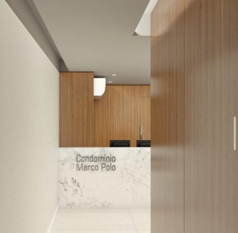 Projeto de interiores de hall de entrada de edifício no Centro de Florianópolis SC, desenvolvido por arquiteta com design elegante, funcional e acolhedor.