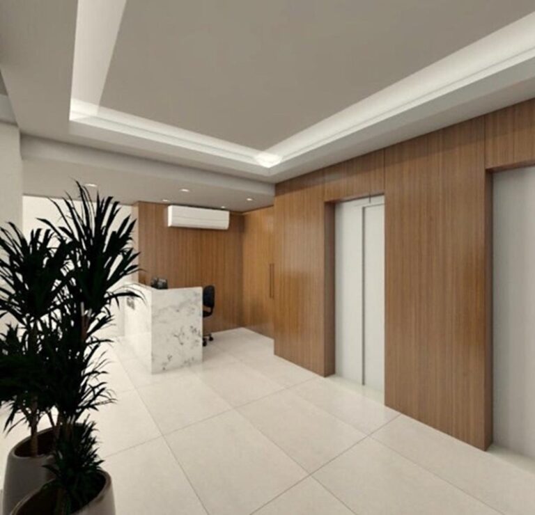 Projeto de interiores de hall de entrada de edifício no Centro de Florianópolis SC, desenvolvido por arquiteta com design elegante, funcional e acolhedor.